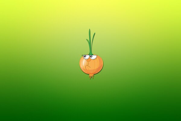 Red onion with eyes on a green background