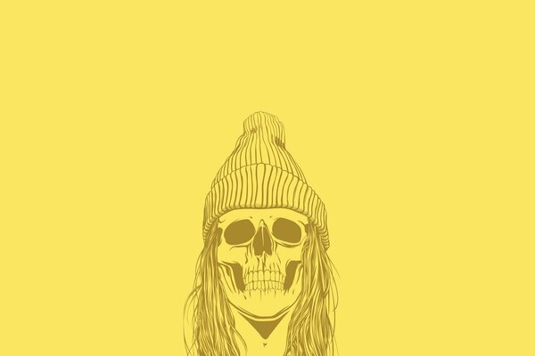 Cranio in un cappello su sfondo giallo