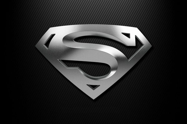 Superman silbernes Schild auf schwarzem Hintergrund