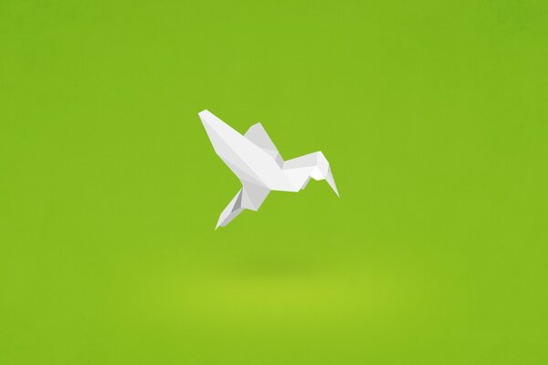 Minimalistic origami image in the form of a hummingbird