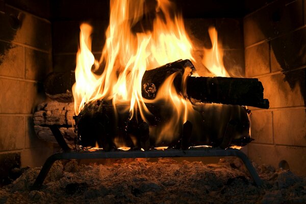 Burning wood in a stone fireplace