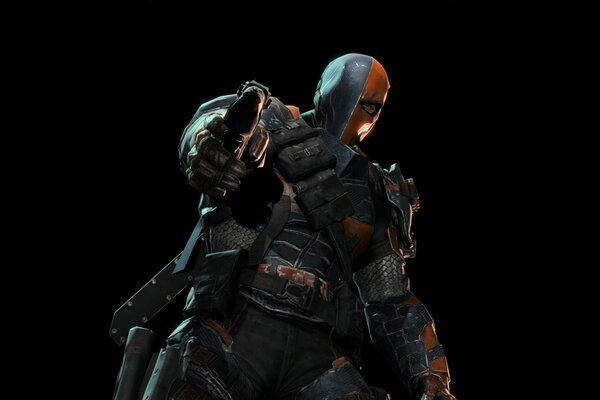 Deathstroke mira con una pistola su sfondo nero