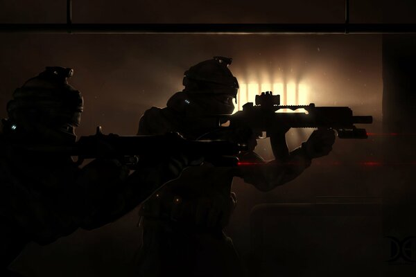 Special forces soldiers with a machine gun in the dark