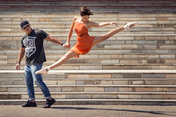 Girl dancing ballet on the street