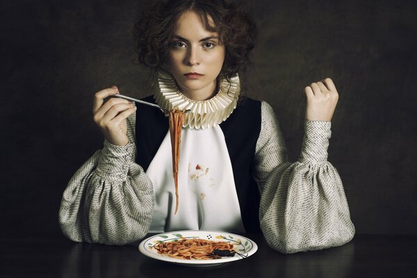 Exquisite lady eating spaghetti