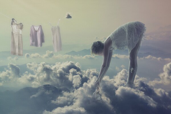 Girl doing laundry in the clouds