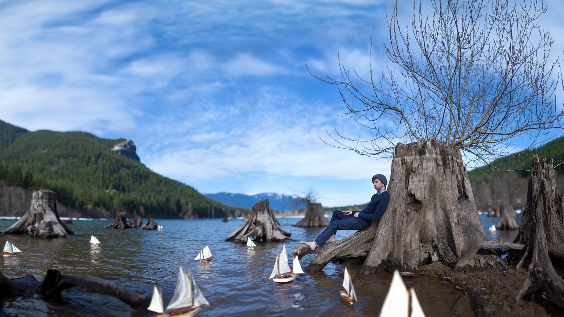 le gars un lac des bateaux des rêves de la situation