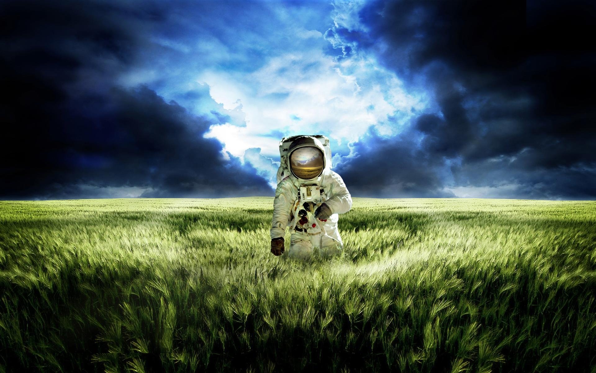 cosmonaut planet the situation sky grass meadow reflection blue the field clouds suit