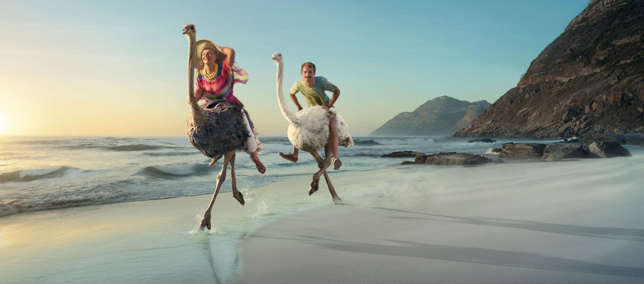 beach sea two men a woman ostriches game