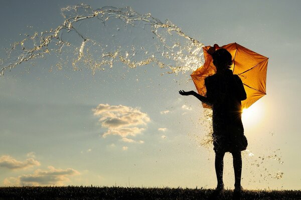 Evening sunset. Water splashes