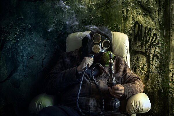 A man smokes in a gas mask