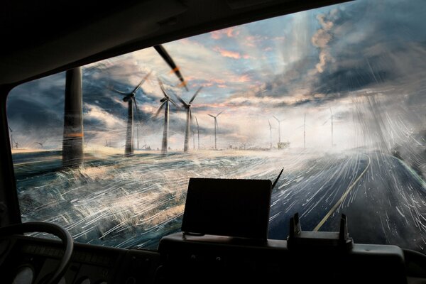 Vista de la carretera y los molinos desde la cabina de la máquina