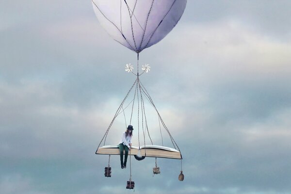 Mädchen in einem Ballon mit Büchern