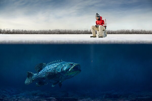 A fisherman catches a huge fish in winter