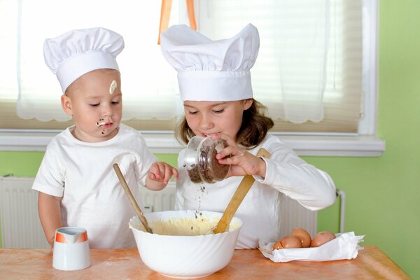 Photo shoot of two children as cooks