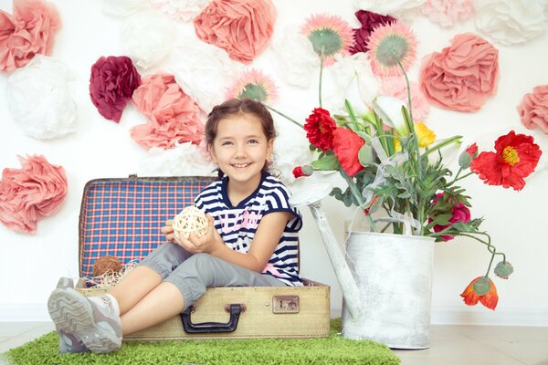 Красивая детская фотосессия девочки с цветами