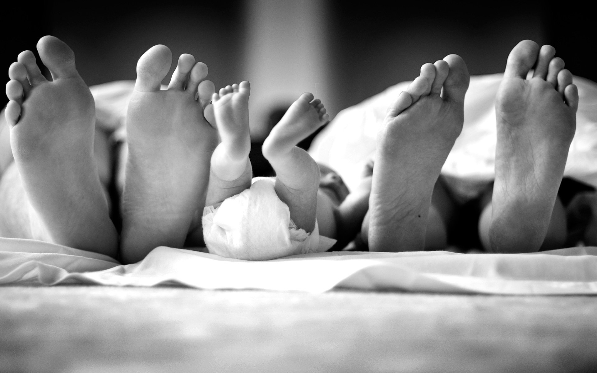 feet family child sleeping b / w black and white