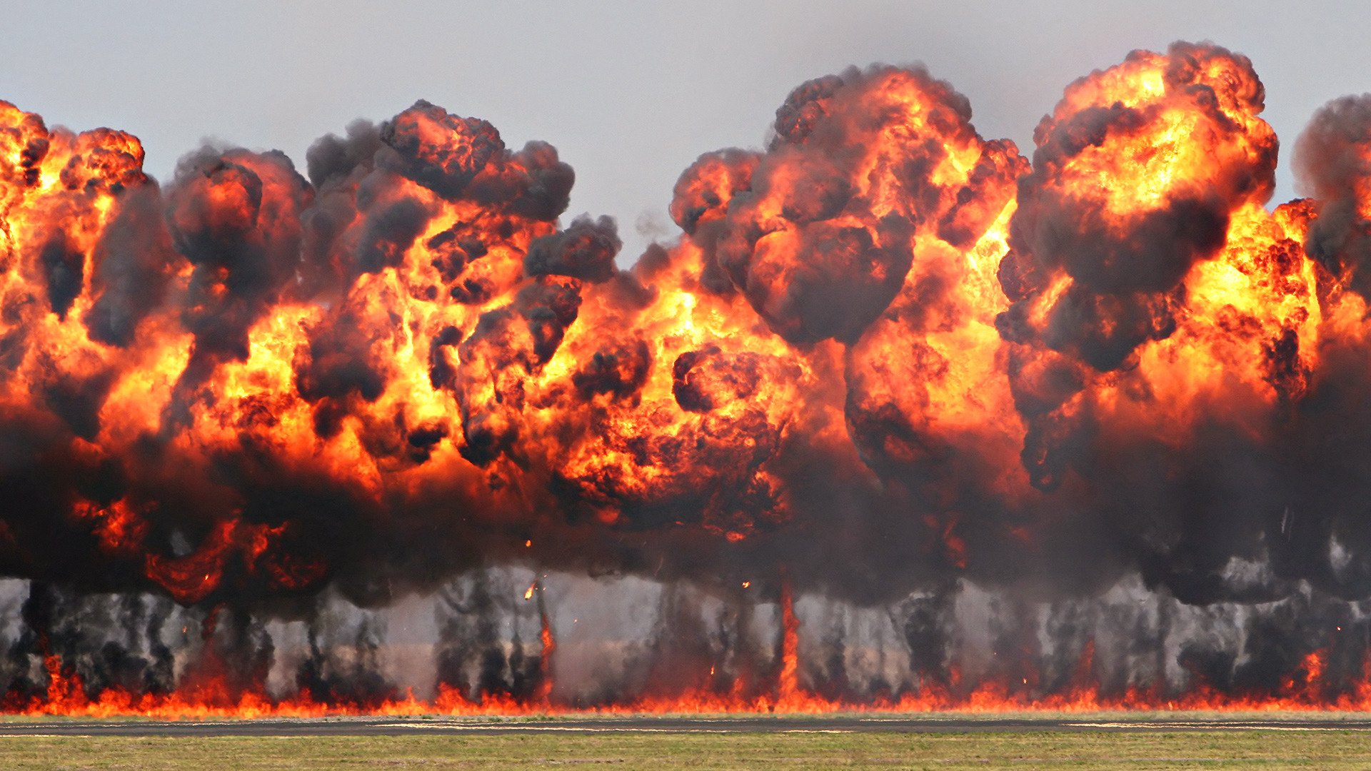 explosiones fuego humo polvo fondo