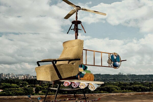 A helicopter made of a chair and various things