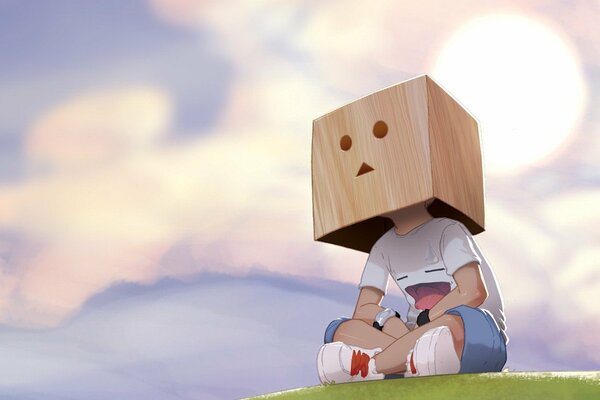 Drawing of a boy sitting on a hill with a box on his head