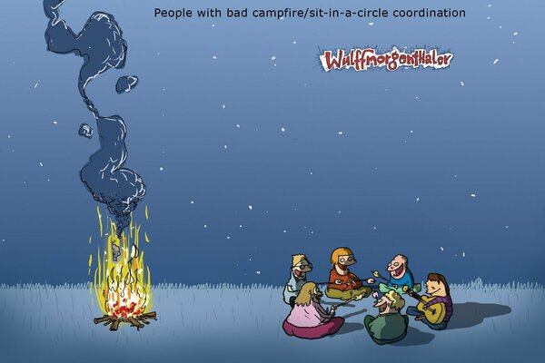 A company is sitting not far from the campfire
