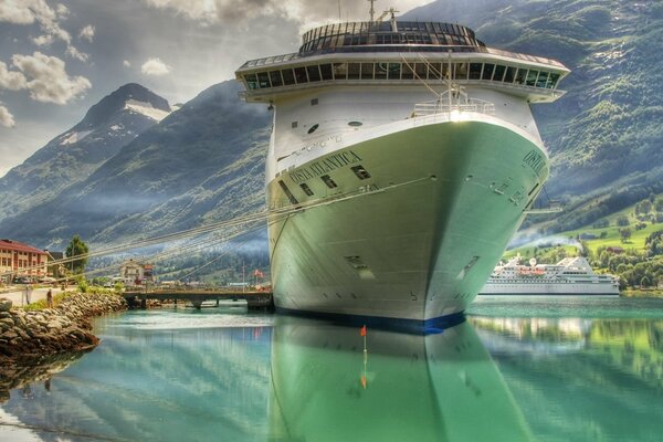 A huge liner is standing on the pier