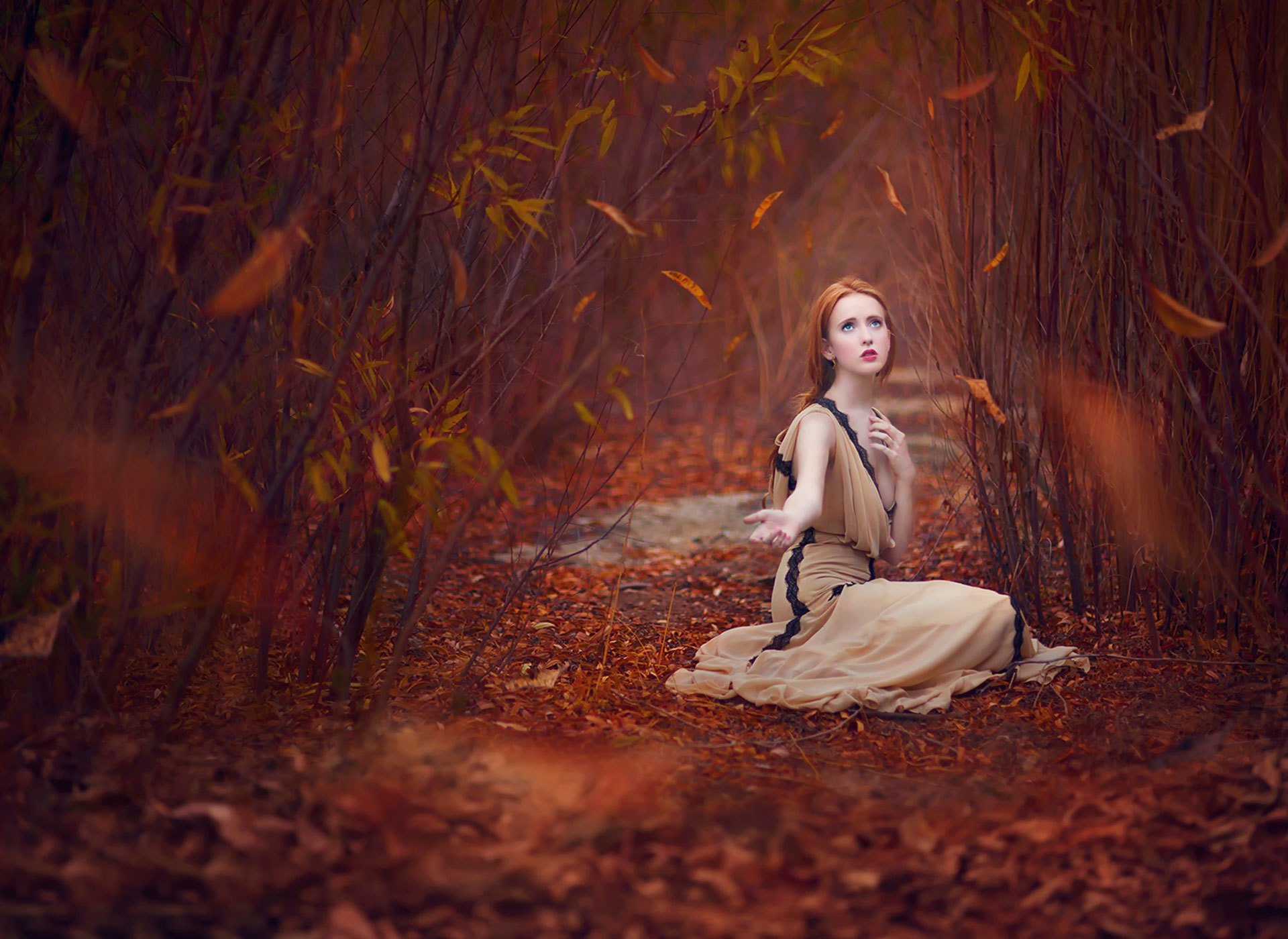 red-haired girl autumn leave