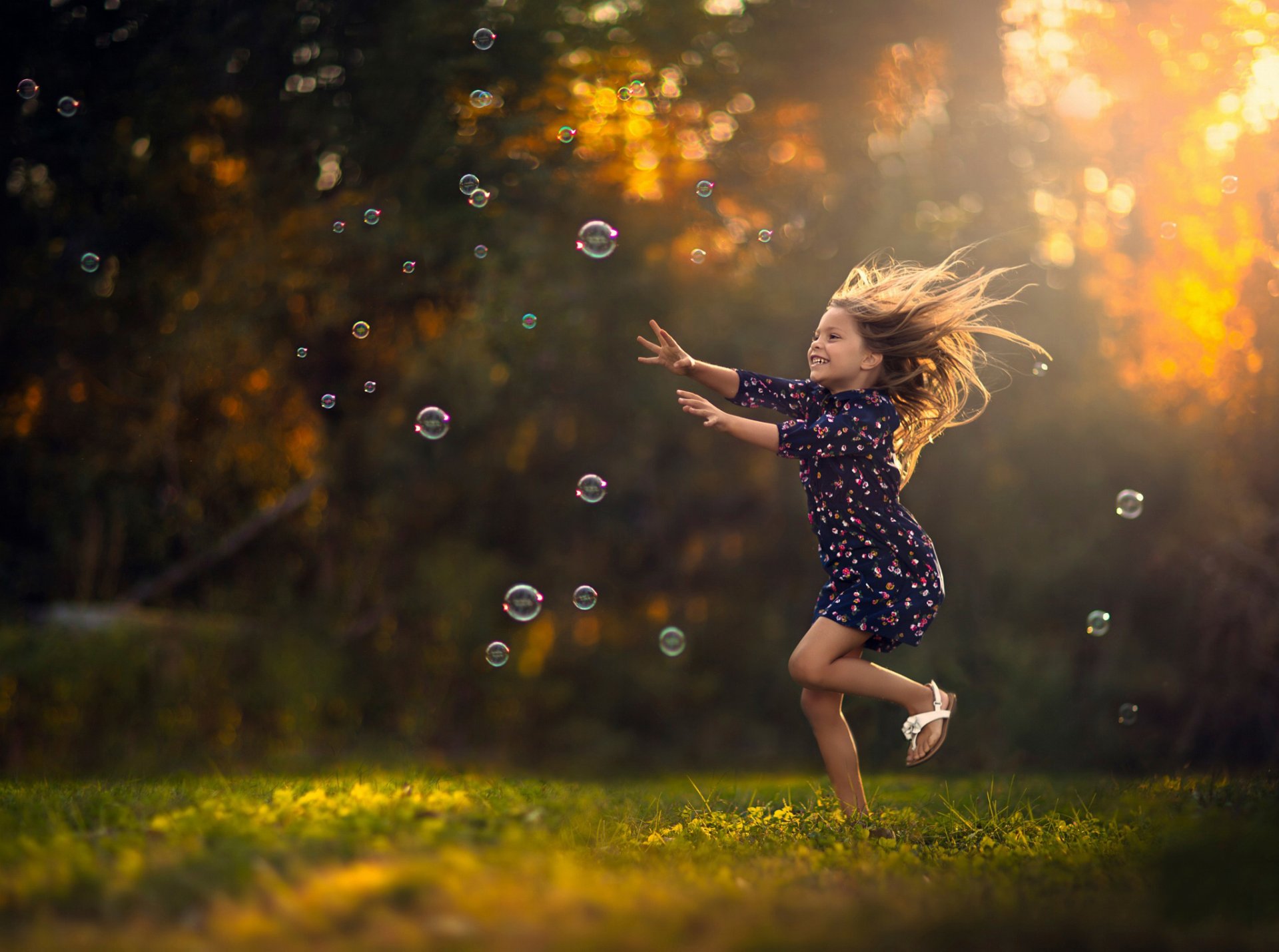 girl running bubbles happine
