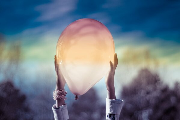 The ball is in the hands of a girl