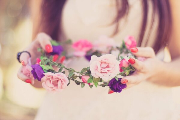 Happy bride with a cute flower wreath