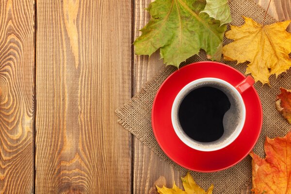 Still life coffee and autumn leaves