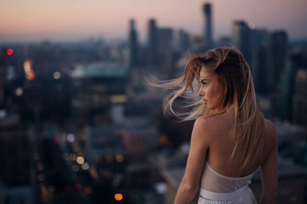 Jesse Herzog against the backdrop of a big city