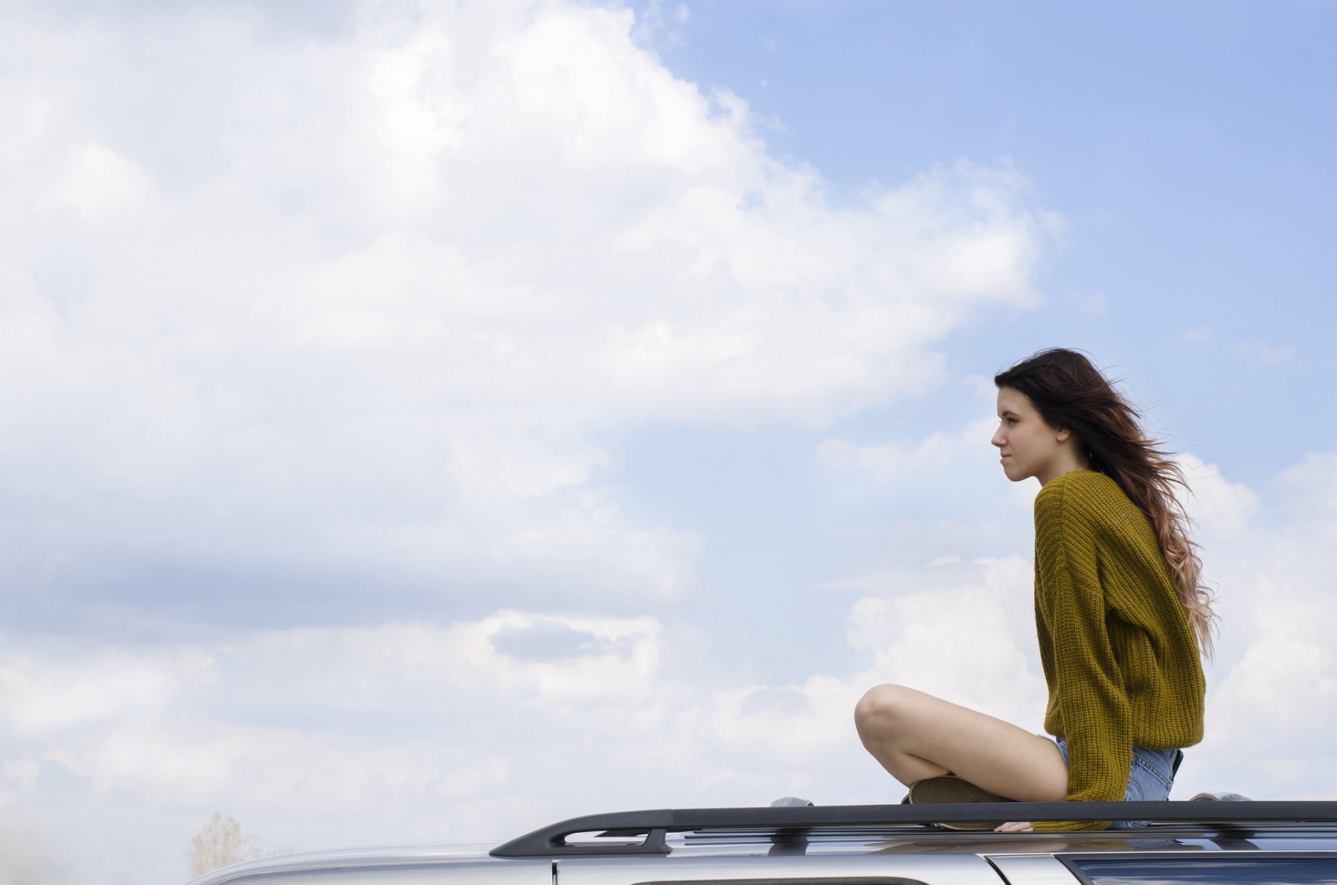 girl shorts vehicles roof sky freedom