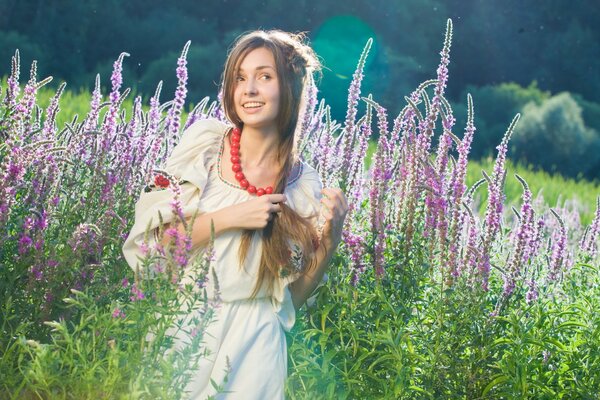 Smiling Ukrainian woman in nature in summer