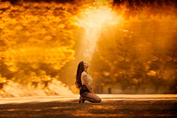 Zooty autumn girl on the road