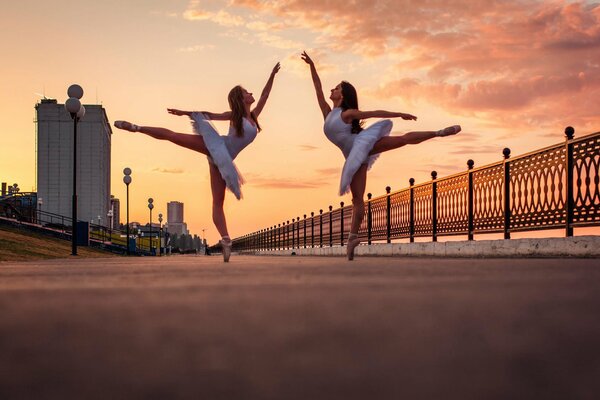 Two ballerinas on the embankment