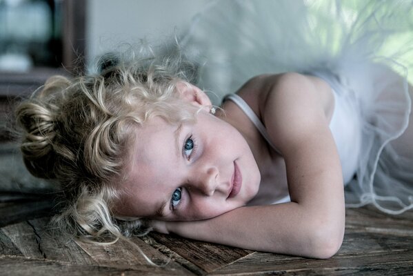 Portrait of a resting ballerina girl