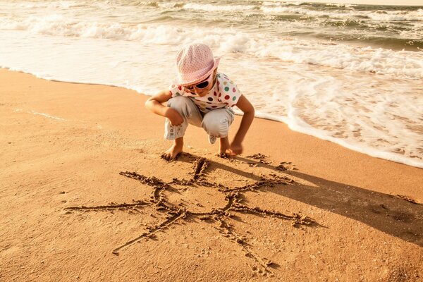 Sunny mood on the beach with children