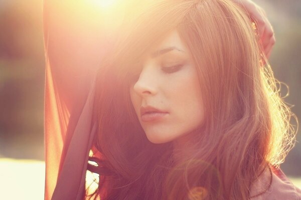 Beautiful brunette at sunset