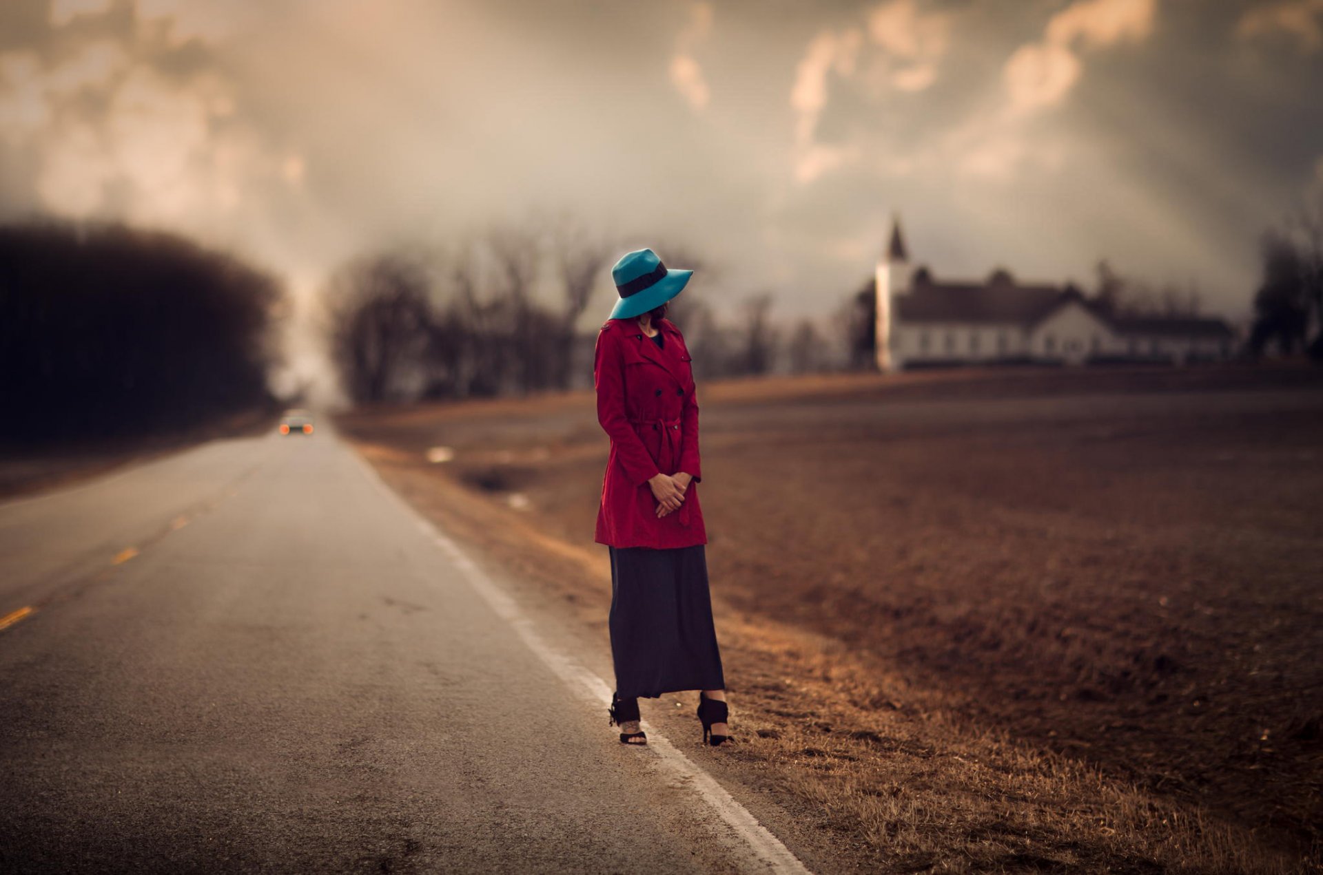 girl hat road arable land blur shoulder church