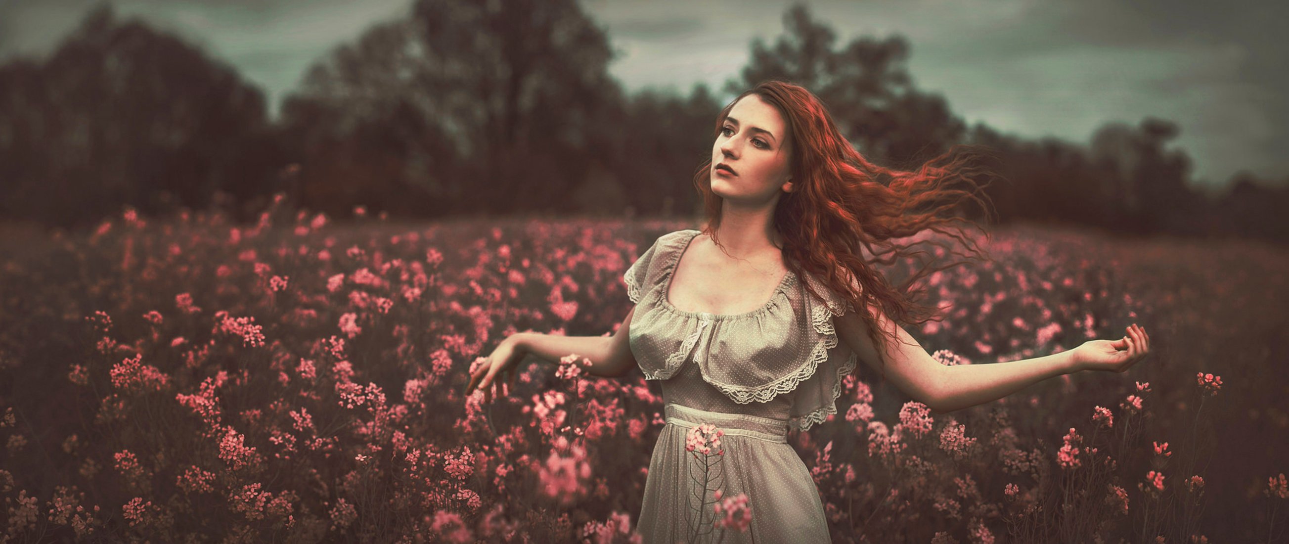 red-haired girl the field flower bokeh