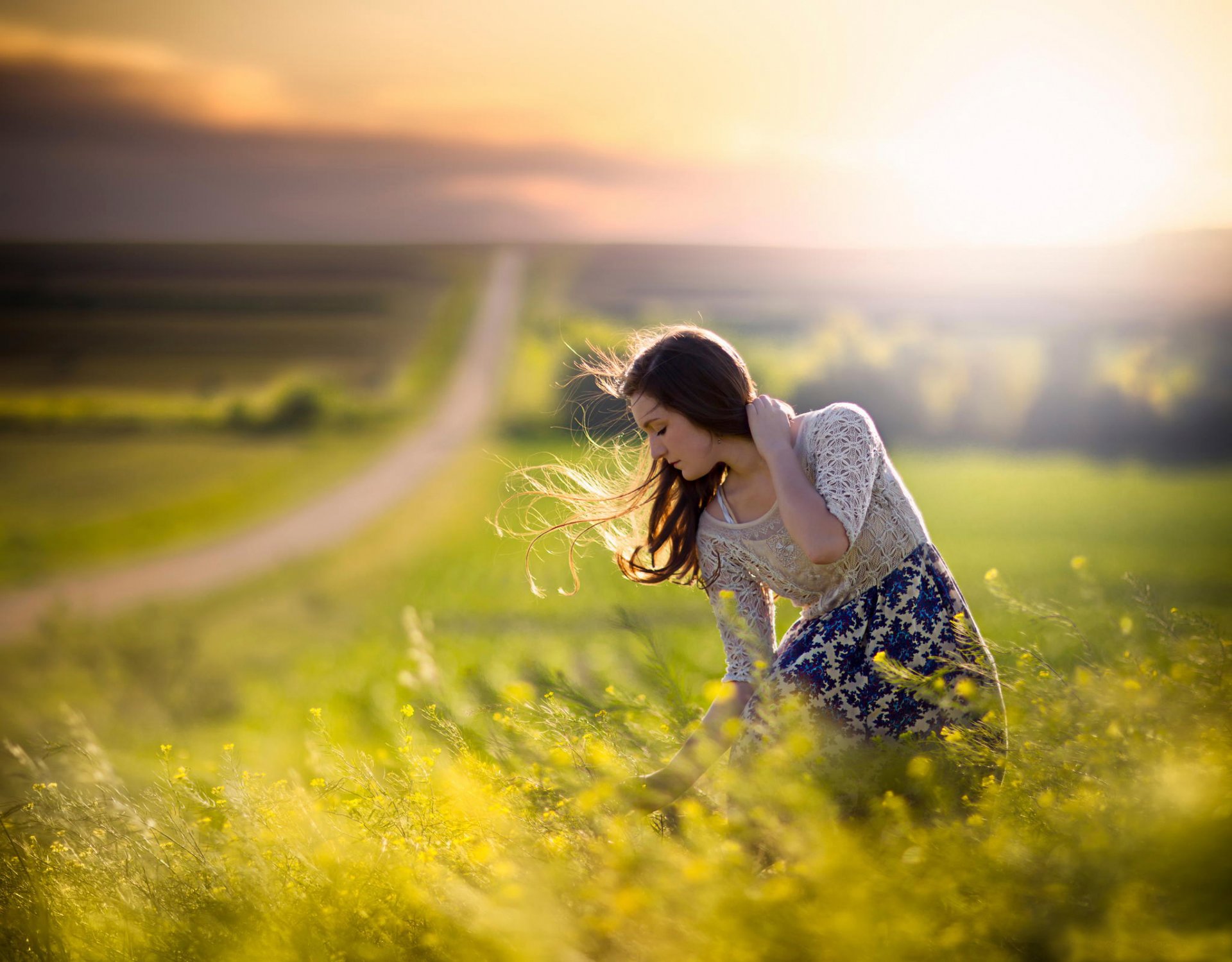 girl the field road space wind