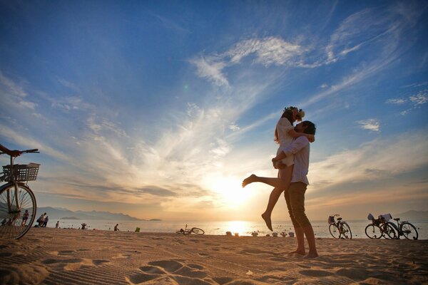 Couple hugs on the beach