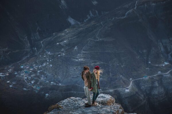 Couple on a cliff on a cliff