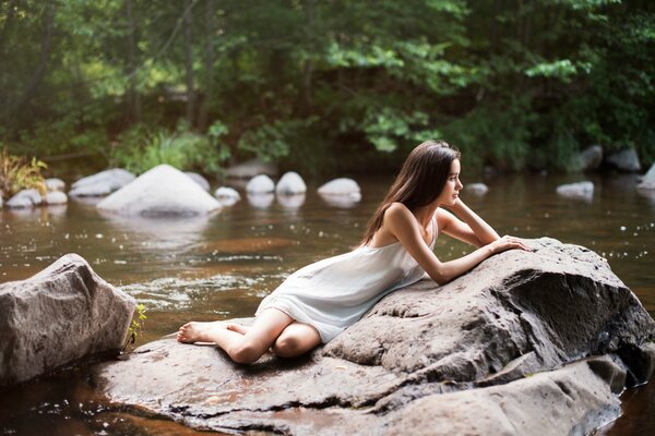 Stone shore with warm water