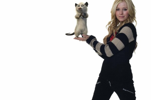 Canadian singer Avril Lavigne on a white background with a cartoon character in her hands