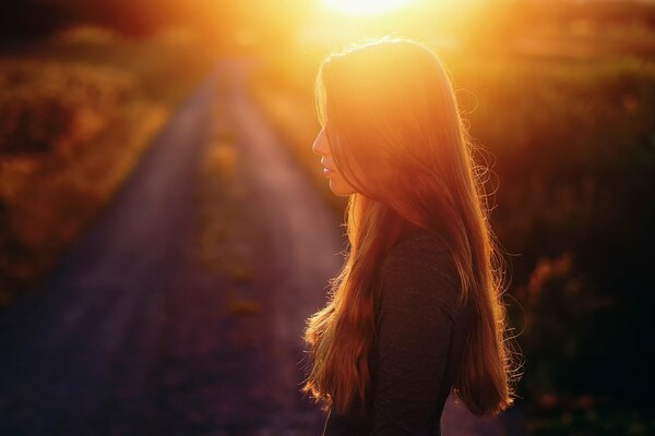 Profile of a girl in the sunlight