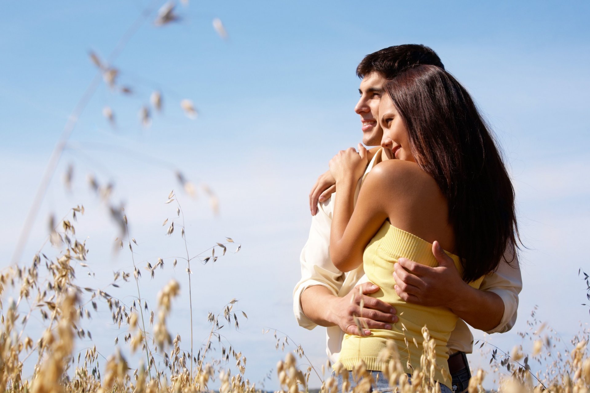 moods girl woman brunette brunette guy man couple lovers love smile hugs plant nature background sky widescreen fullscreen widescreen wallpaper