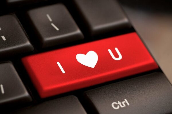 Red button on the keyboard with a heart