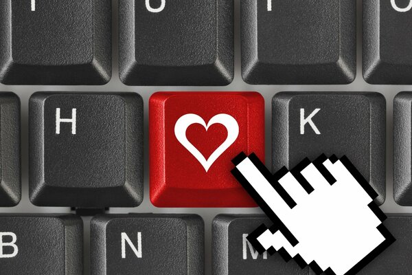 Bouton de clavier rouge avec coeur